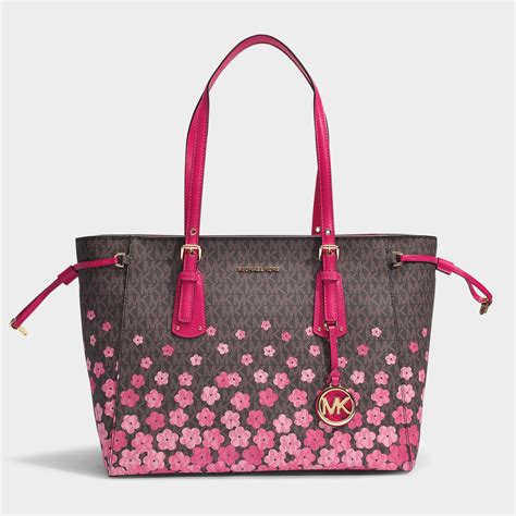 michael kors metallic voyager tote|michael kors zip top tote.